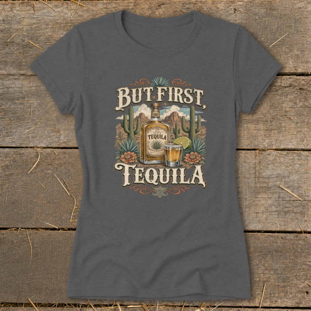"But First, Tequila" graphic on a grey t-shirt featuring a tequila bottle and shot glass.