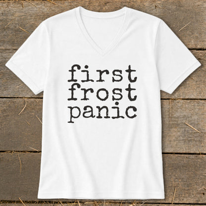 White v-neck t-shirt with black text "first frost panic".