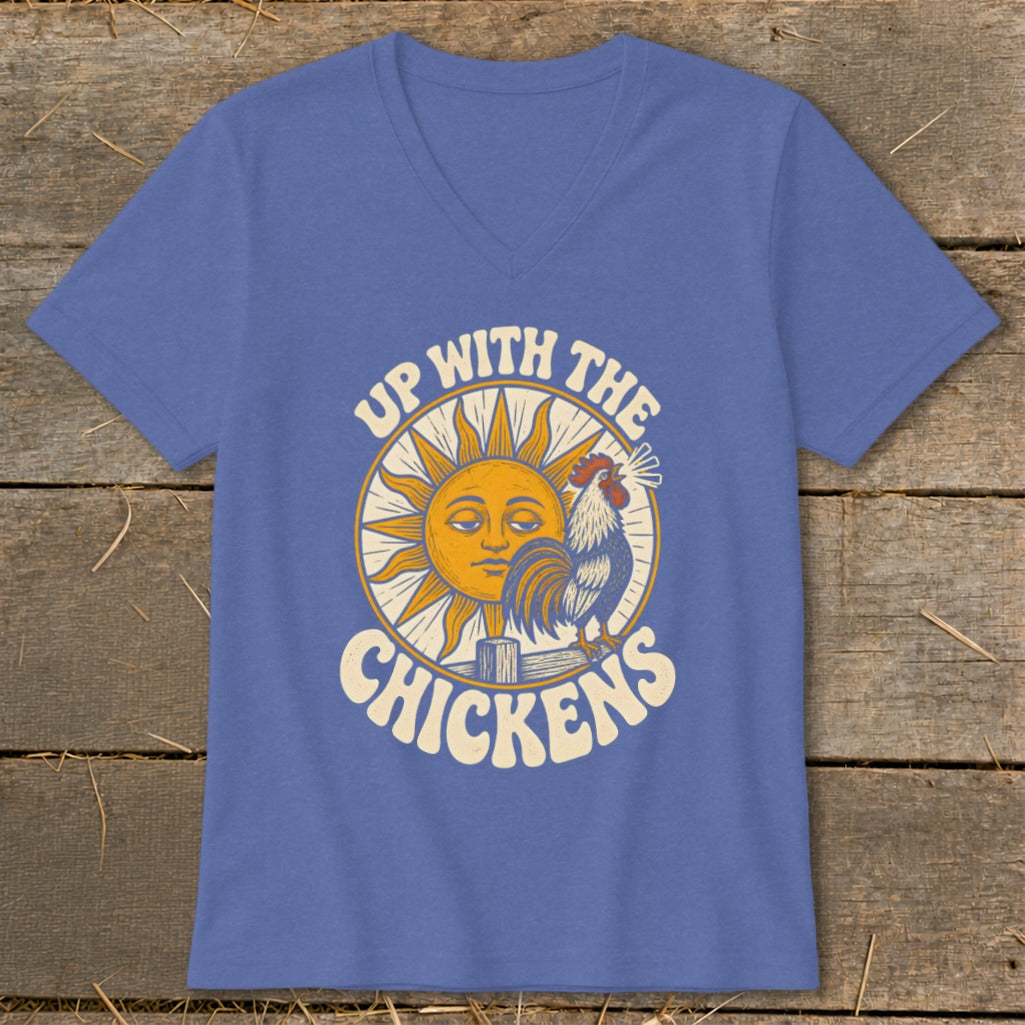 A blue V-neck t-shirt featuring a retro graphic of a sun and rooster with the text "Up With The Chickens".