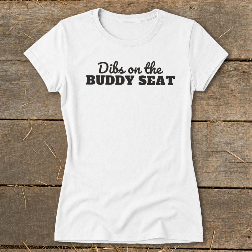 White t-shirt with black text reading "Dibs on the BUDDY SEAT".