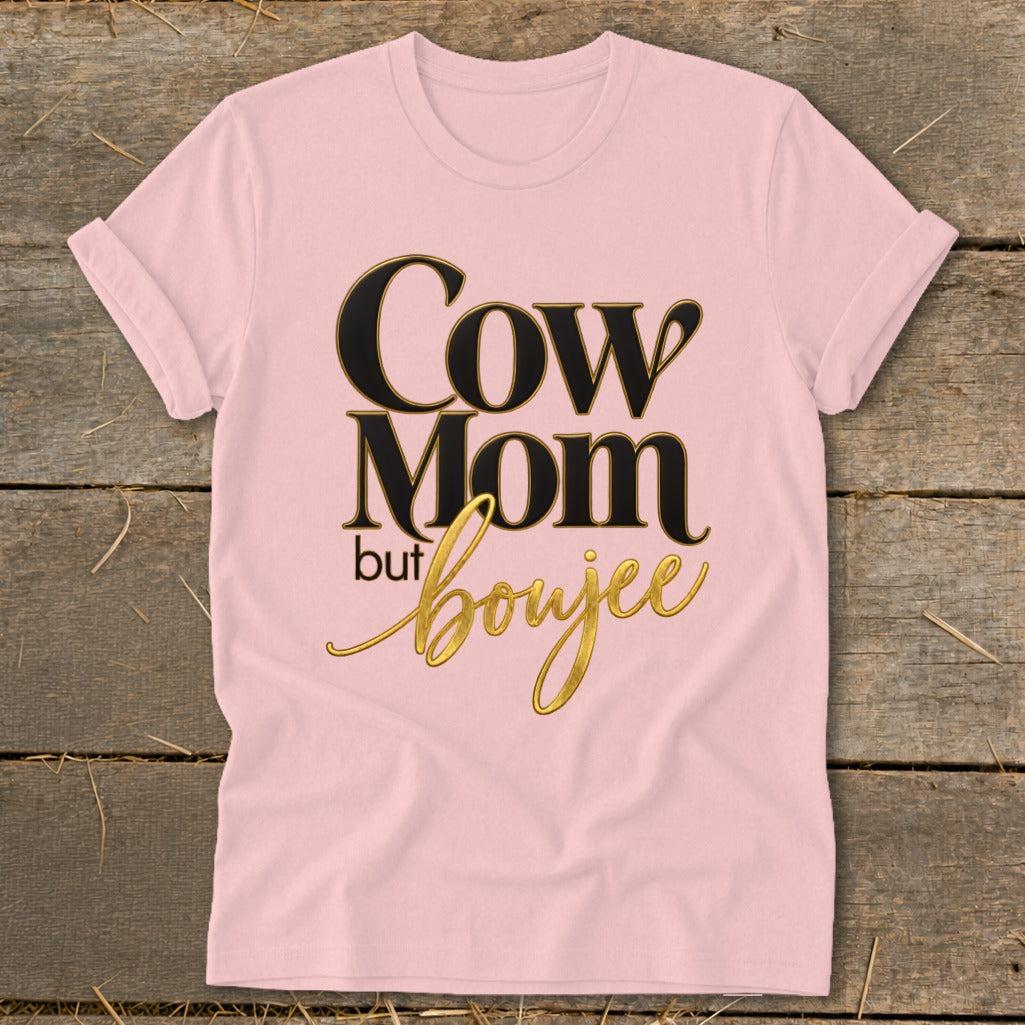 Pink t-shirt with "Cow Mom but boujee" text in black and gold.