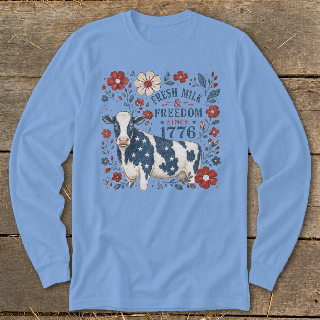 Cow with American flag pattern and floral design with "Fresh Milk & Freedom Since 1776" text.