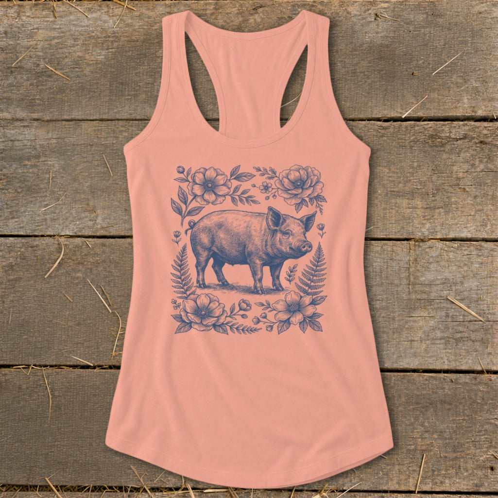 Peach tank top with a vintage-style pig and floral graphic design.