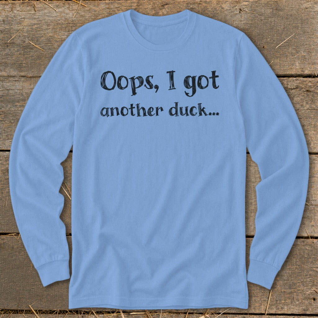 Light blue long sleeve shirt with black text "Oops, I got another duck...".