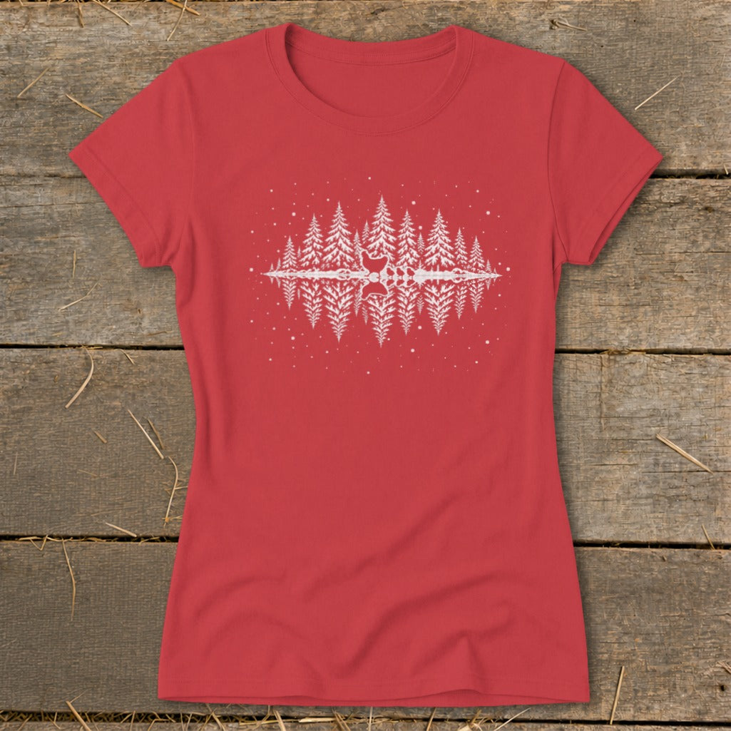 Red t-shirt with a white forest reflection graphic and scattered dots.