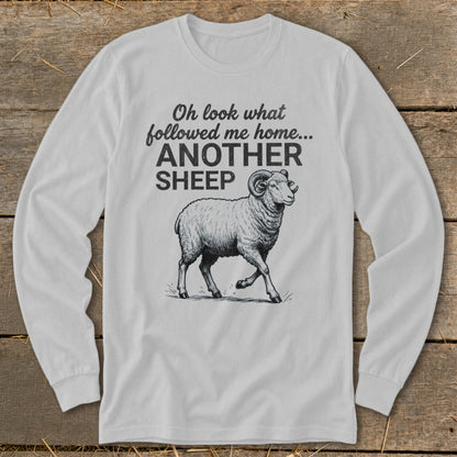 Light gray long-sleeve shirt with a ram illustration and text: "Oh look what followed me home... ANOTHER SHEEP."