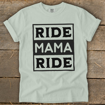 Light green t-shirt with black text "RIDE MAMA RIDE" in three stacked boxes.