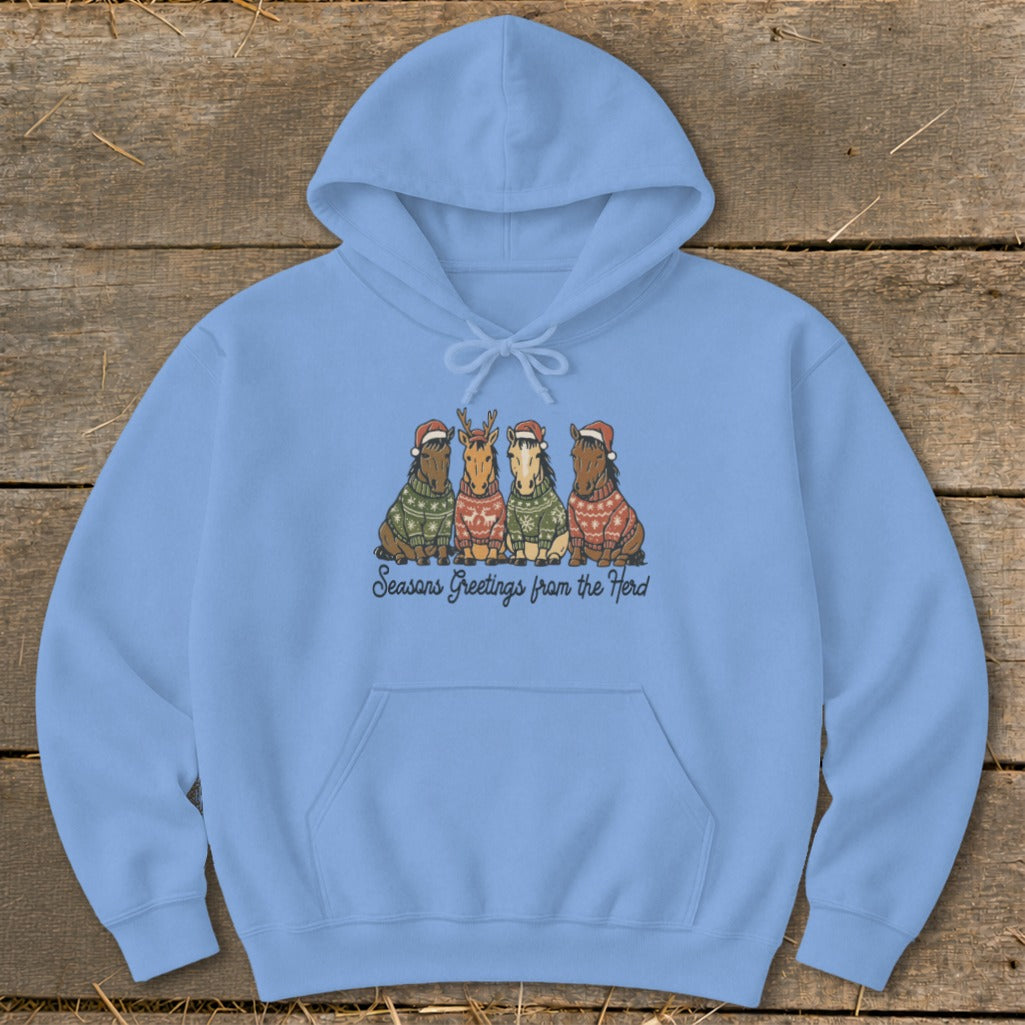 Light blue hoodie with four horses in Christmas sweaters and Santa hats.