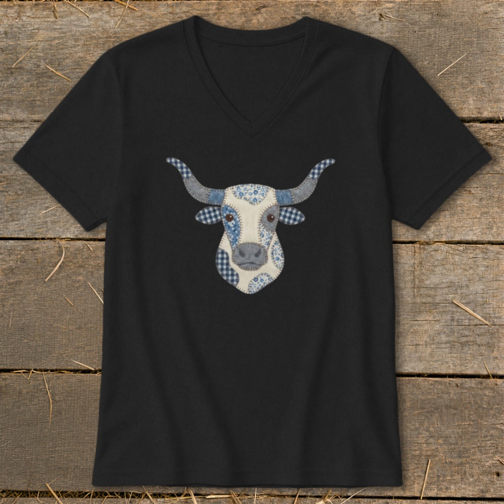 Black t-shirt with a patchwork longhorn bull head graphic in blue and white.