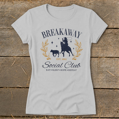 Gray t-shirt with "Breakaway Social Club Est. 1882 Eat Sleep Rope Repeat" graphic.