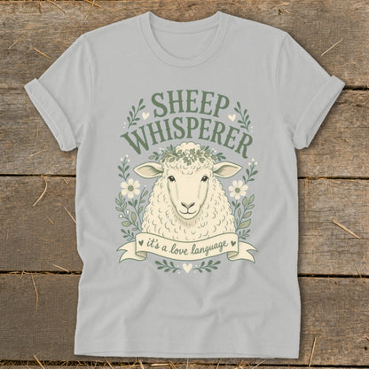 Sheep whisperer design with sheep, flowers, and text "it's a love language."