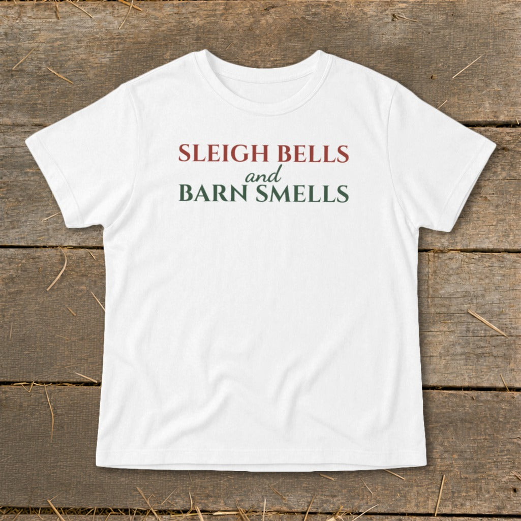 White t-shirt with red and green text reading "SLEIGH BELLS and BARN SMELLS".