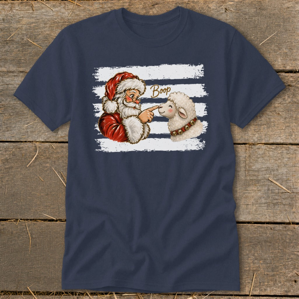 Santa booping a sheep's nose on a navy t-shirt with white stripes.
