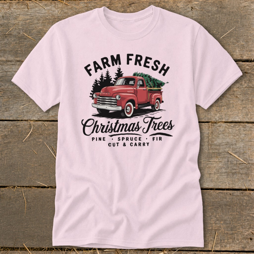Pink t-shirt with Farm Fresh Christmas Trees design featuring a red truck.