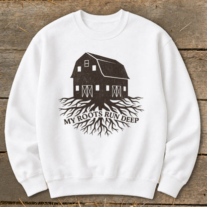 White sweatshirt with a dark barn graphic and "My Roots Run Deep" text.