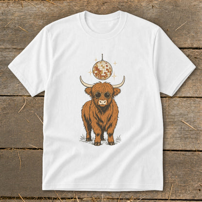 Highland cow wearing sunglasses under a disco ball on a white t-shirt.