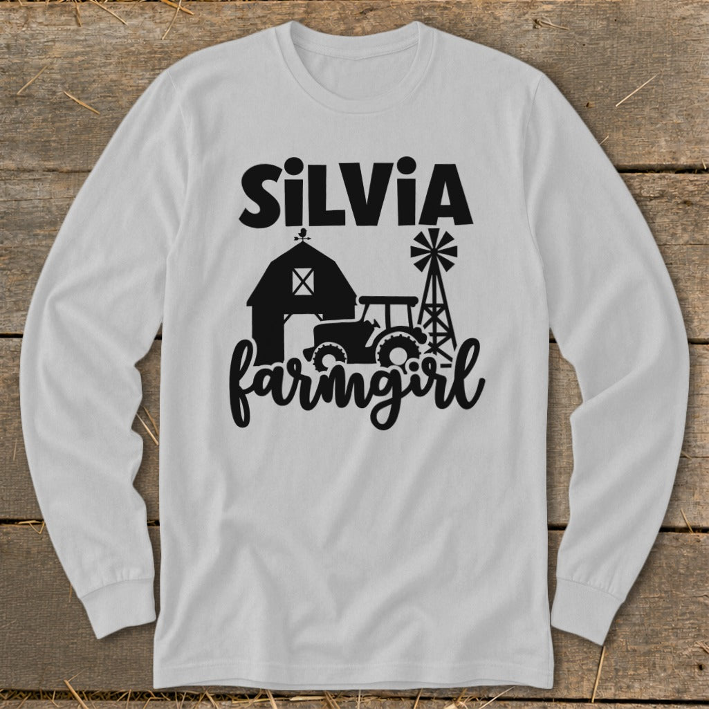 White long-sleeve shirt with "SILVIA farmingirl" and farm graphics.