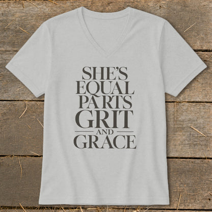 Light grey v-neck t-shirt with "She's Equal Parts Grit and Grace" text.