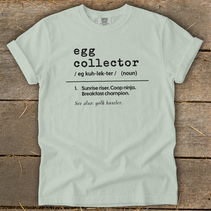 Light green t-shirt with "egg collector" definition including "yolk hustler".