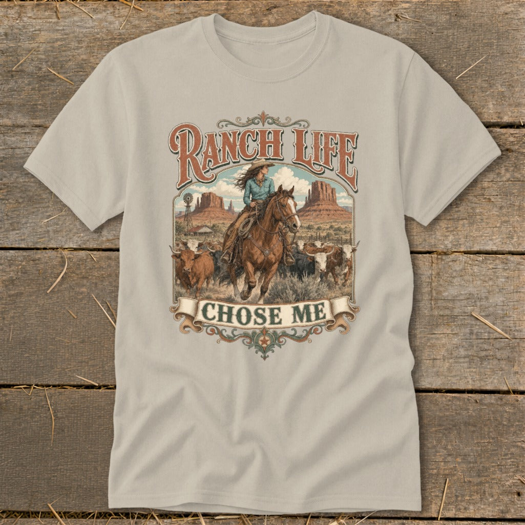 T-shirt with "Ranch Life Chose Me" text, cowgirl on horseback herding cattle.