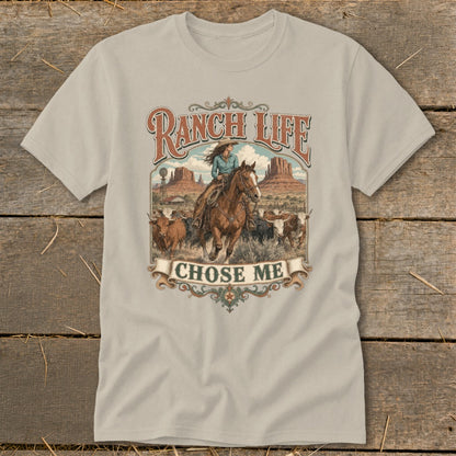 T-shirt with "Ranch Life Chose Me" text, cowgirl on horseback herding cattle.