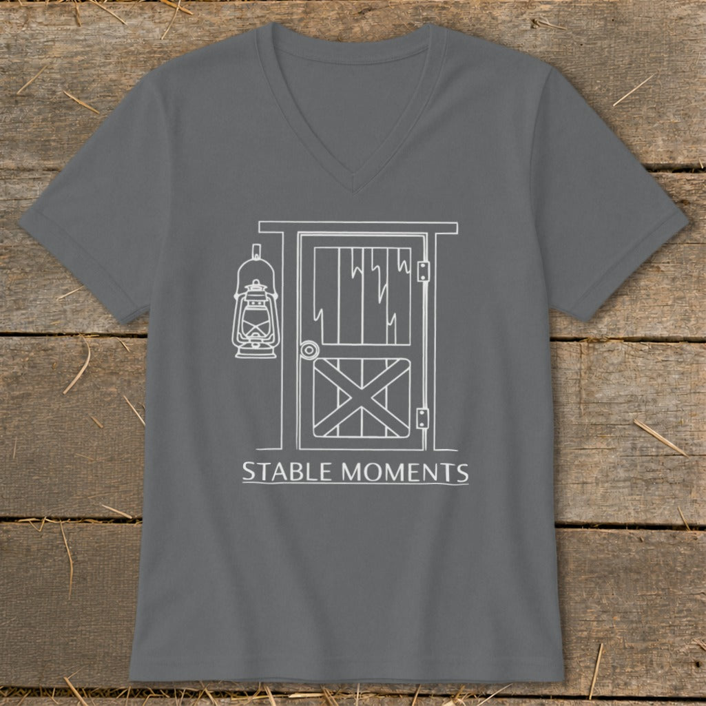 Grey t-shirt with white line art of a barn door and lantern, text reads "STABLE MOMENTS".