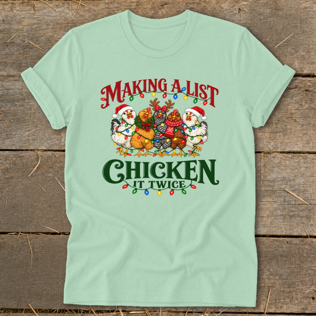 Christmas chickens in Santa hats and scarves with lights and text "Making a list, chicken it twice."