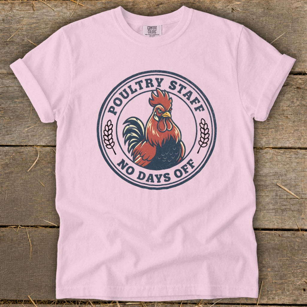 Pink t-shirt with circular graphic of a rooster and text "POULTRY STAFF NO DAYS OFF".
