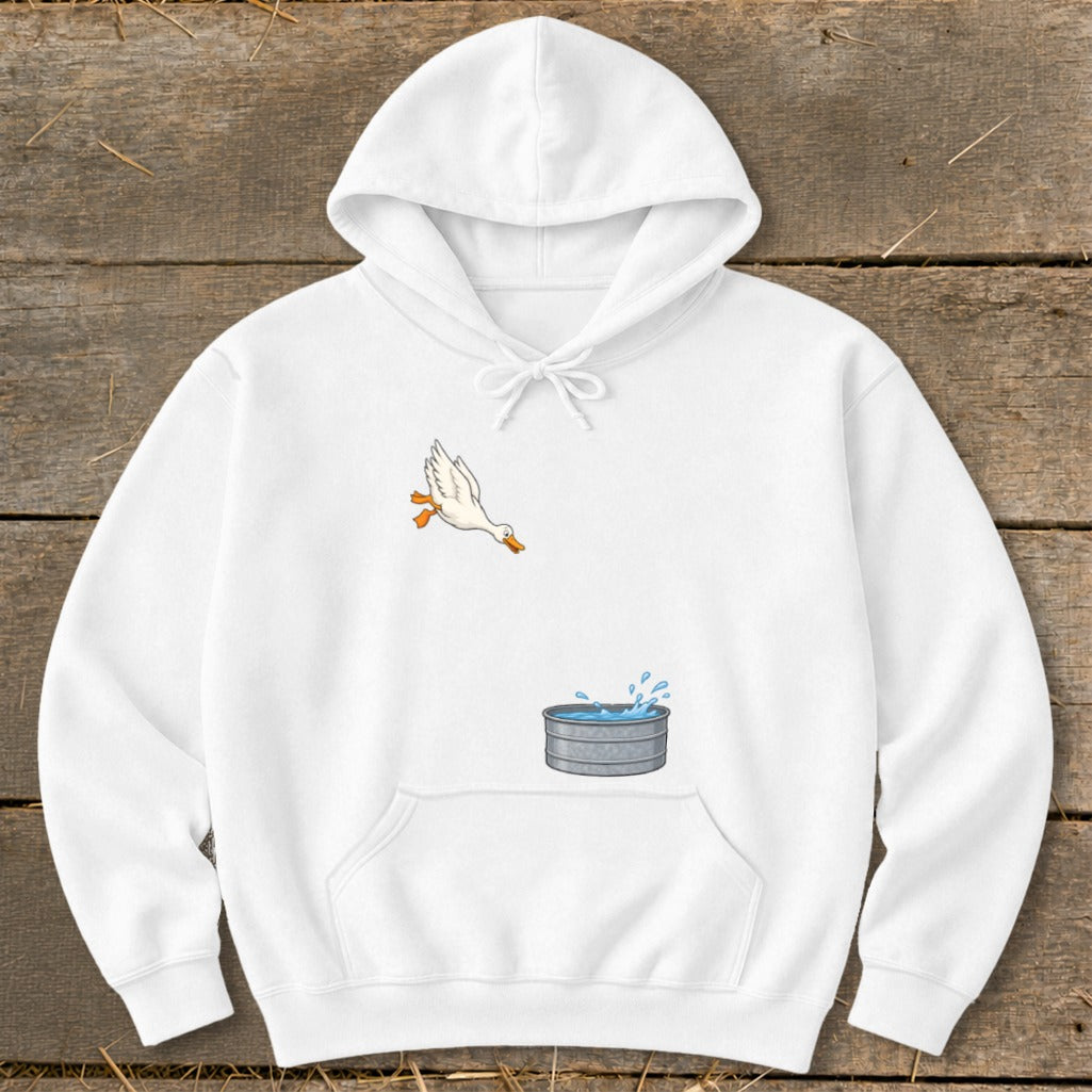 White hoodie with a graphic of a duck flying towards a watering trough.