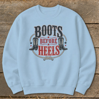 Light blue sweatshirt with "Boots Before Heels" text and cowboy boots graphic.