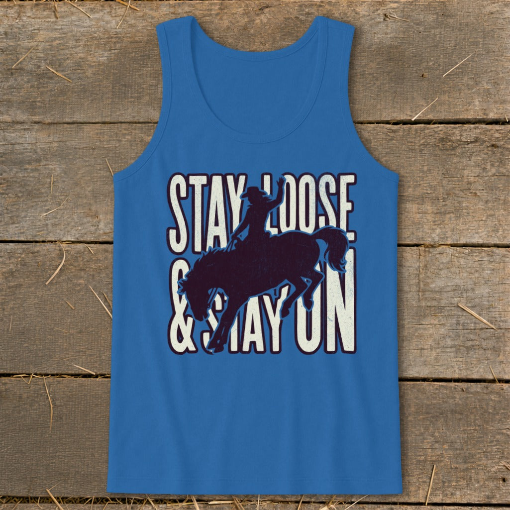 Blue tank top with "STAY LOOSE & STAY ON" text and bronc rider silhouette.