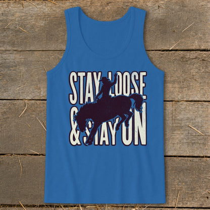 Blue tank top with "STAY LOOSE & STAY ON" text and bronc rider silhouette.