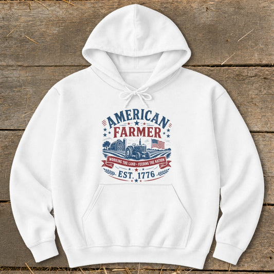 White hoodie with "American Farmer Working the Land Feeding the Nation Est. 1776" graphic.