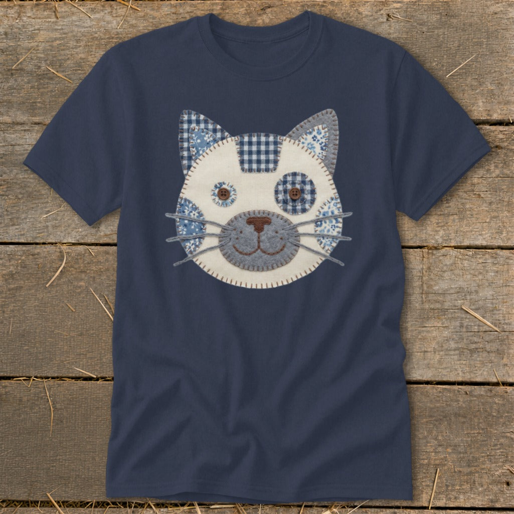 Dark blue t-shirt with a patchwork cat face design on the front.