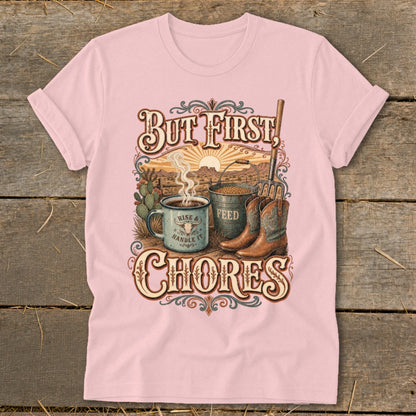 "But First, Chores" text with cowboy boots, coffee mug, and feed bucket on desert landscape.