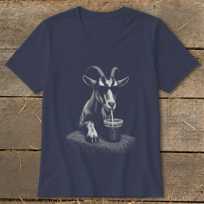 Goat wearing sunglasses drinks from a cup with a straw on a dark t-shirt.