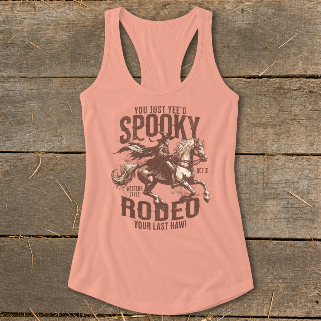 Peach tank top with "Spooky Rodeo" graphic featuring a cowboy riding a horse.