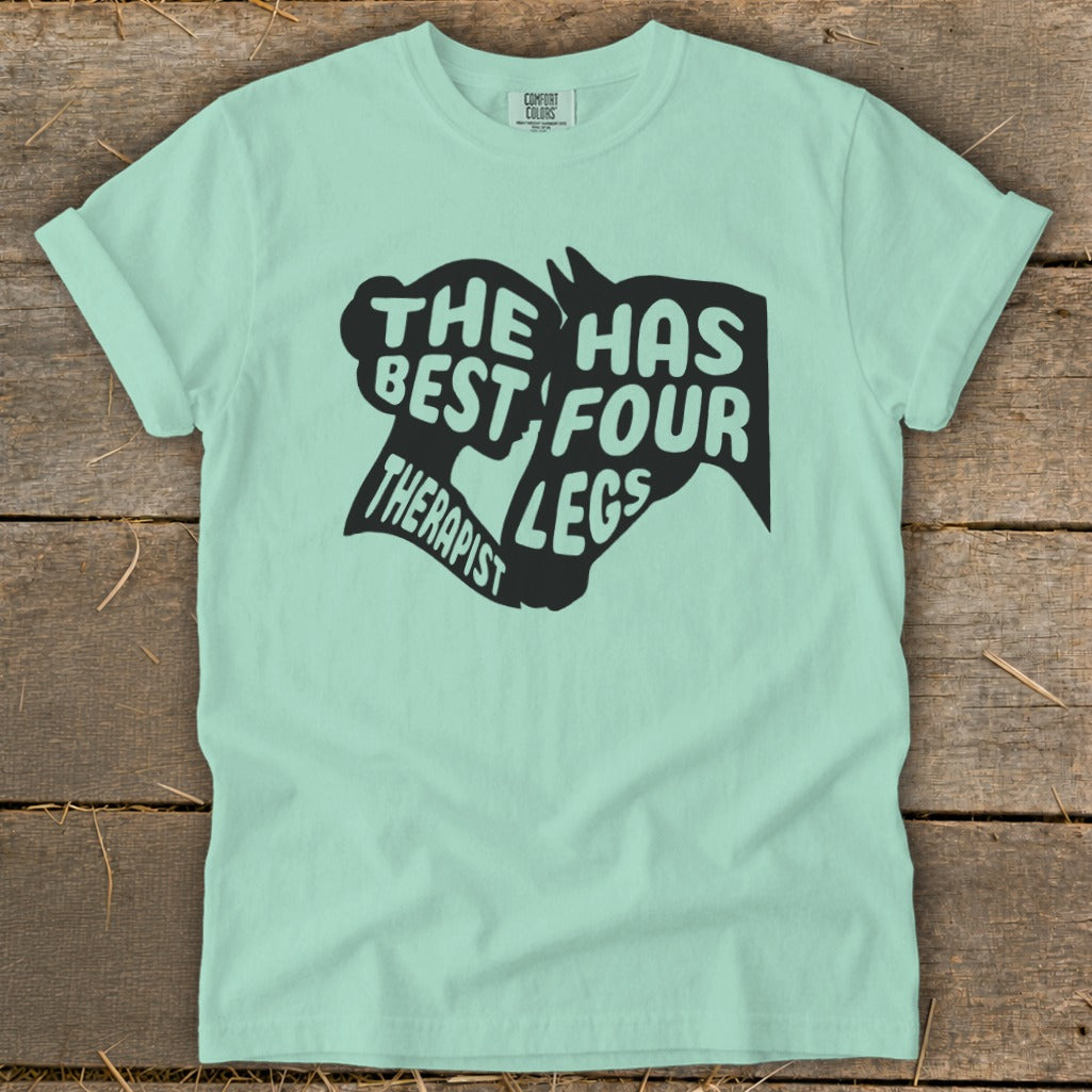 Mint t-shirt with black graphic text "The Best Therapist Has Four Legs".