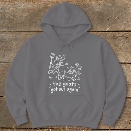 Gray hoodie with a white line drawing of a farmer chasing two goats and text that reads "the goats got out again."