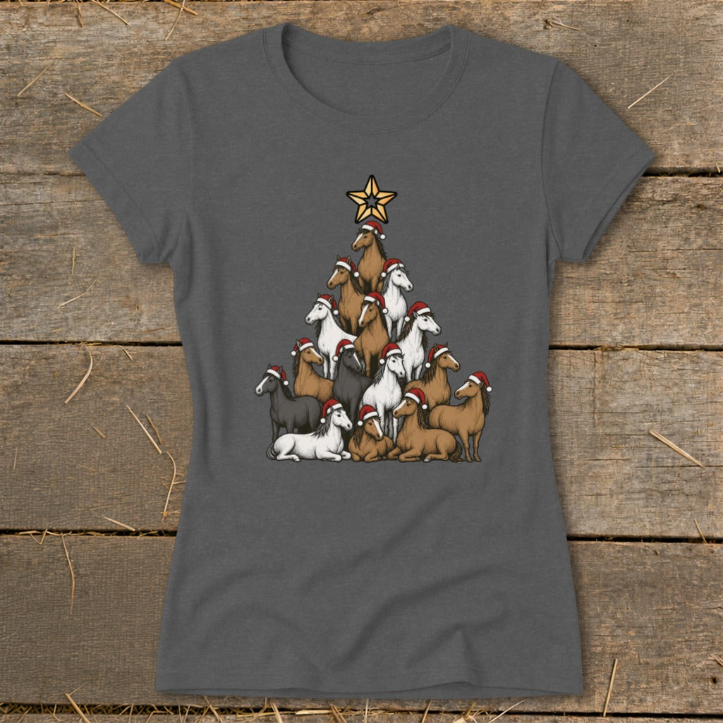 Christmas tree shaped arrangement of horses wearing Santa hats with a star on top.