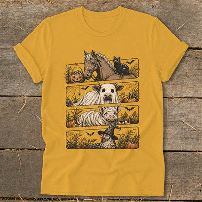 T-shirt with four Halloween farm animal illustrations: horse with cat, cow ghost, pig mummy, and chicken witch.