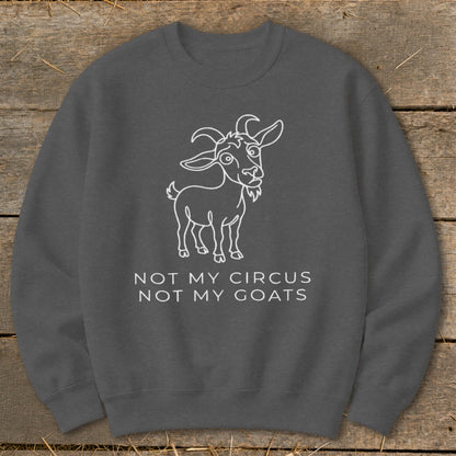 Dark gray sweatshirt with white outline drawing of a goat and text "NOT MY CIRCUS NOT MY GOATS".