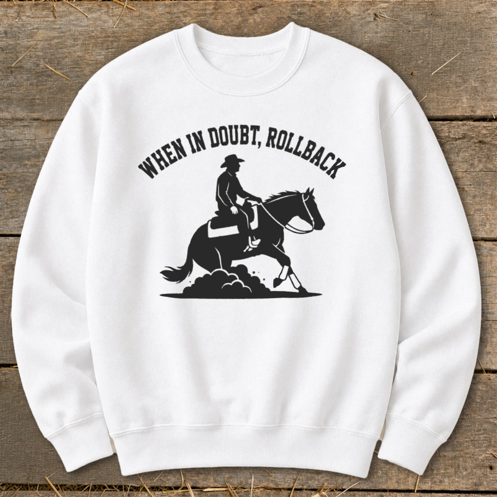 White sweatshirt with a black graphic of a cowboy on a horse and "When in doubt, rollback".