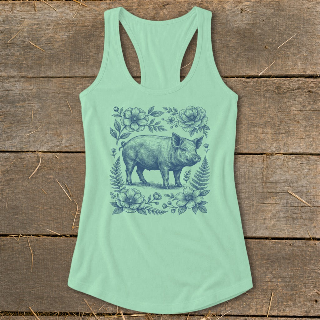 Light green tank top with a vintage pig and floral illustration.