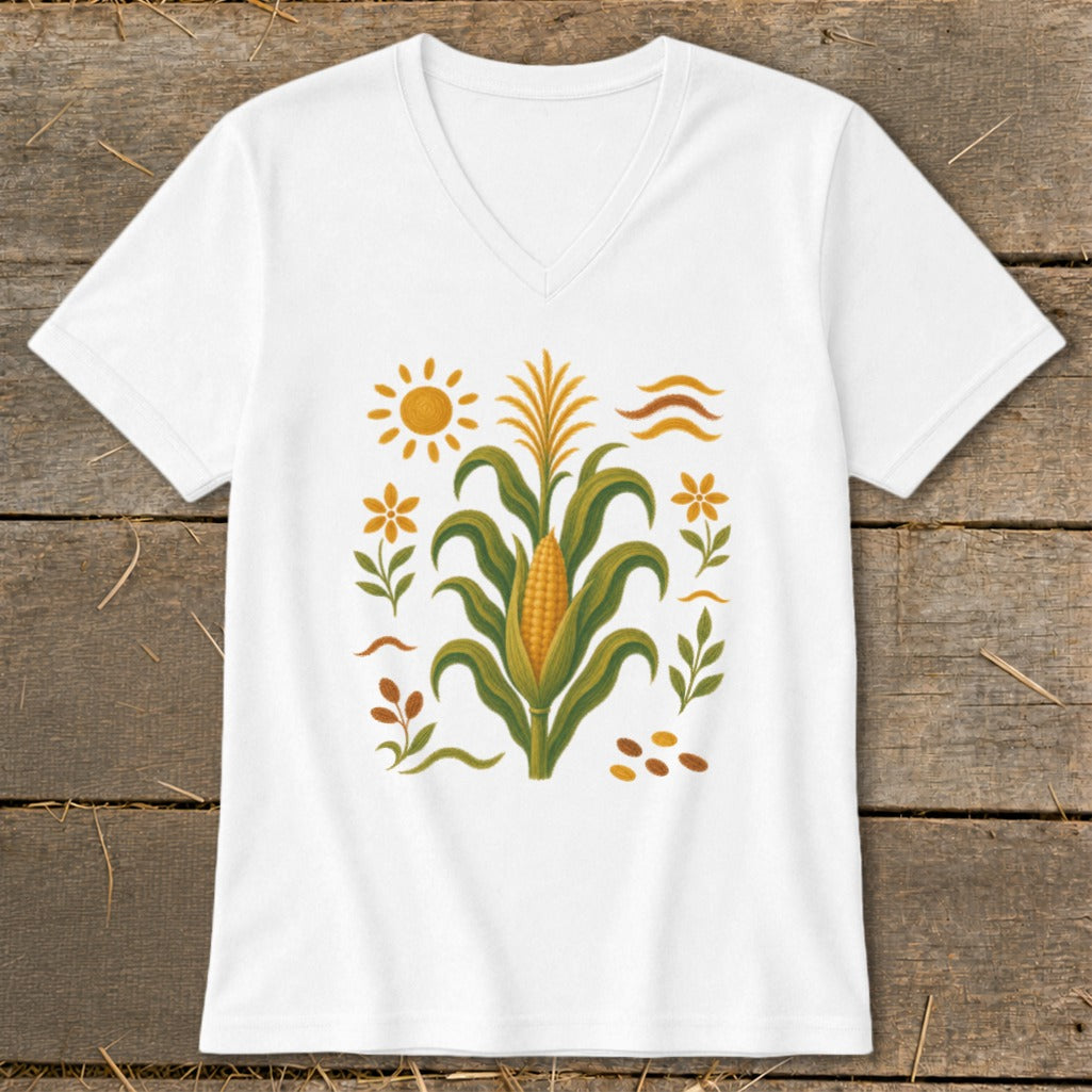 White t-shirt with a stylized corn stalk, sun, and floral elements.