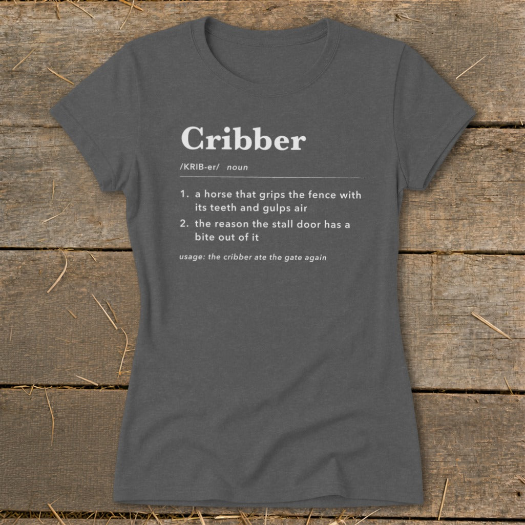 Dark grey t-shirt featuring dictionary-style text defining the word cribber with horse-related definitions.