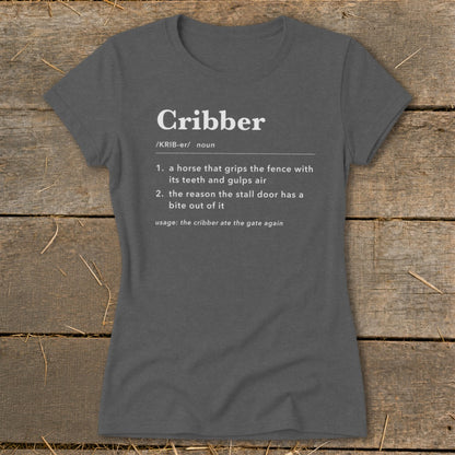 Dark grey t-shirt featuring dictionary-style text defining the word cribber with horse-related definitions.