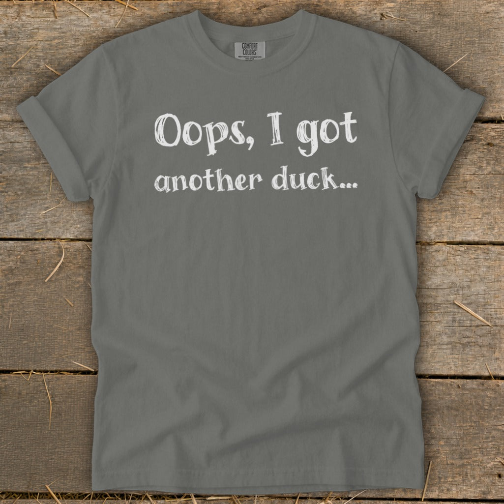Gray t-shirt with white text "Oops, I got another duck..."
