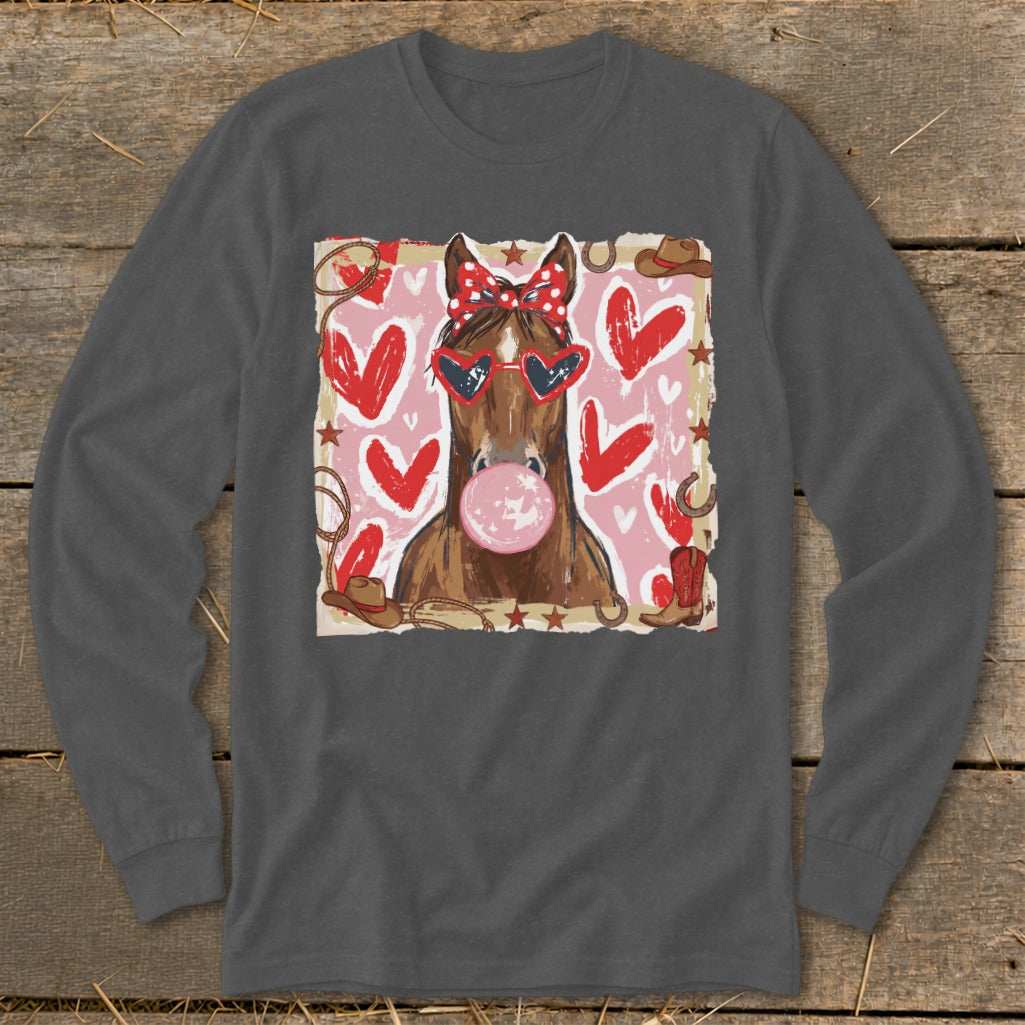 Horse with heart sunglasses blowing bubble gum, on a graphic with hearts and western elements.