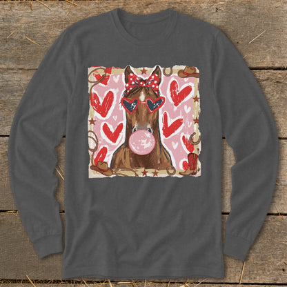 Horse with heart sunglasses blowing bubble gum, on a graphic with hearts and western elements.